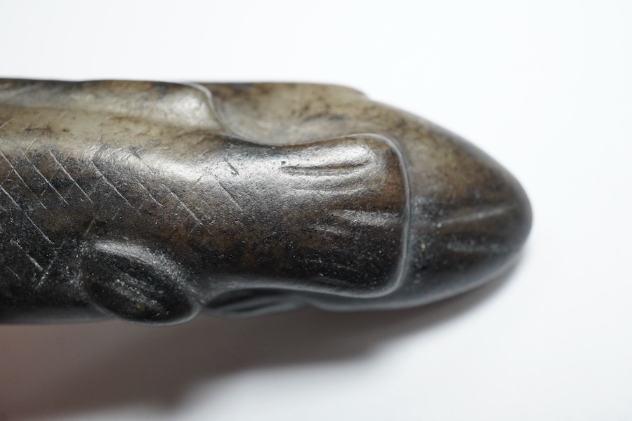 A Chinese black and white jade 'fish' sword fitting, Song or later